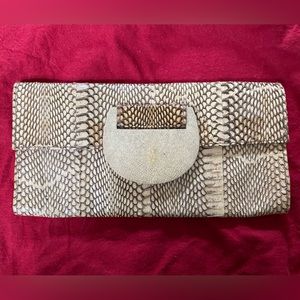 R&Y Augousti Leather clutch, with tag (pre-owned)